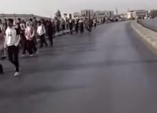احتجاج بالسير على الأقدام بين مدينتين أردنيتين